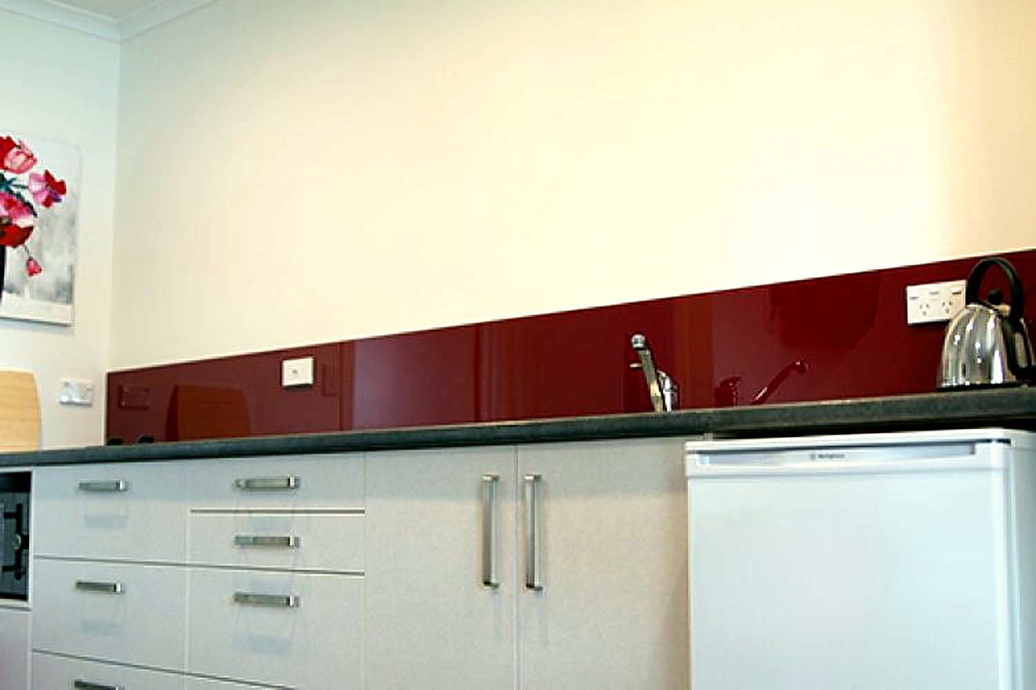 Second view of the kitchenette bench and cabinetry